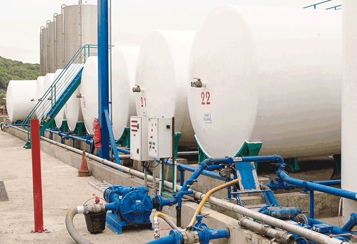 OLVEA Group uses large storage tanks to house the oil prior to transferring it to 330-gallon IBCs and 50-gallon drums